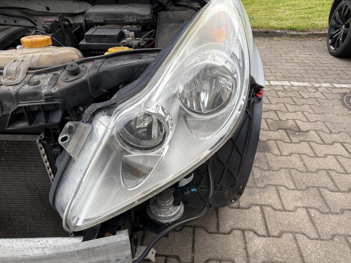 Opel Corsa D original Scheinwerfer links Halogen Vorfacelift BJ10